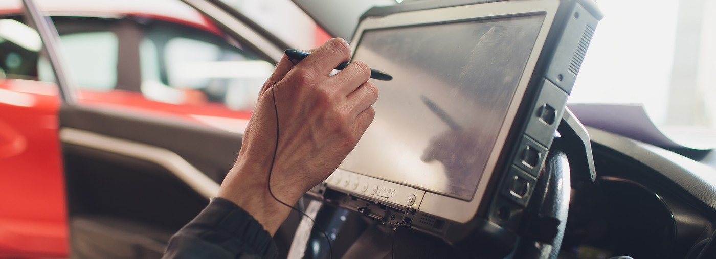 Mechanic diagnosing a vehicle - Car Diagnostics Bathgate