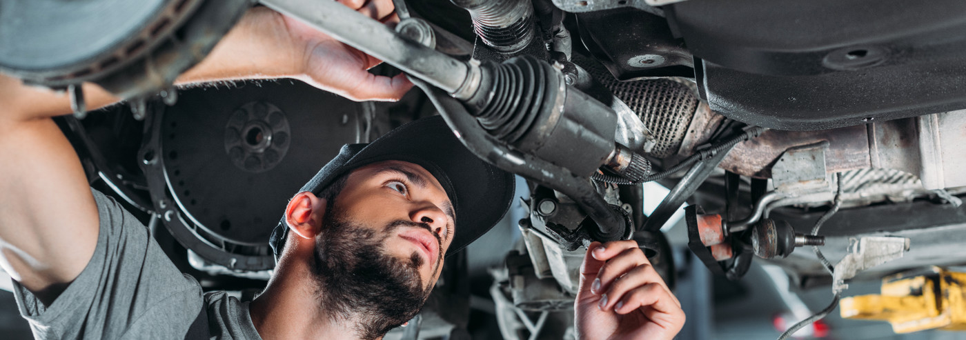 Mechanic checking under a vehicle - Car Repairs Bathgate